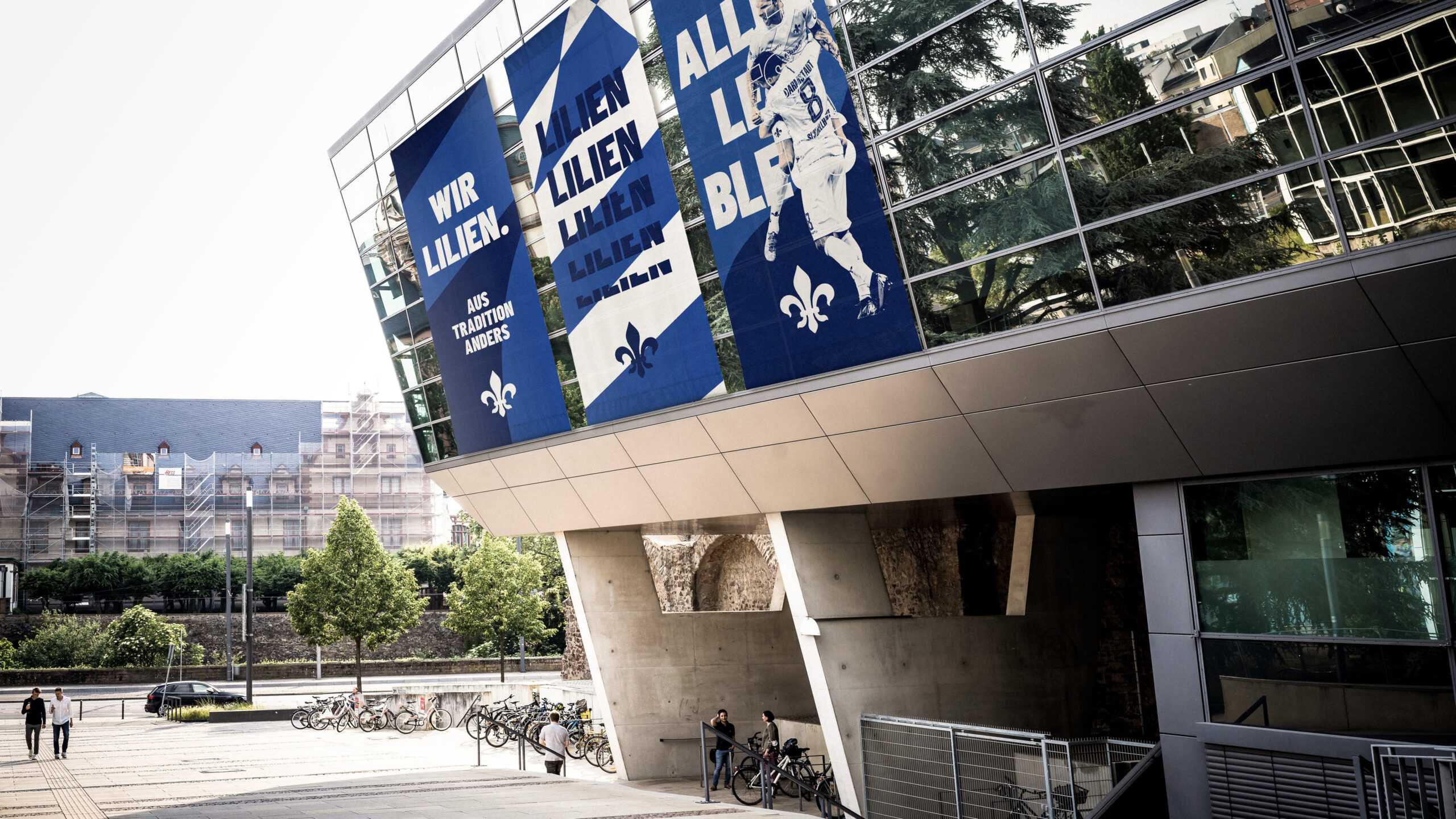 stadium with posters on the outside